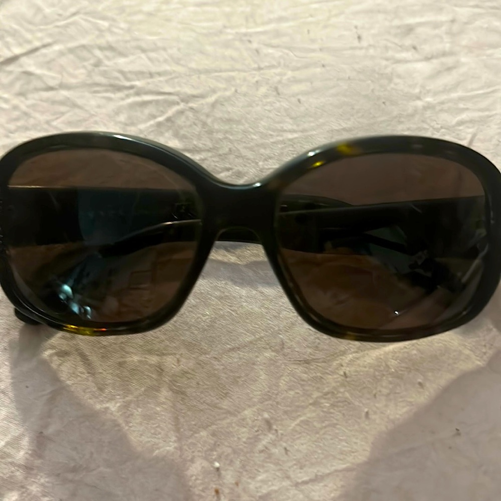 Authentic Prada sunglasses , 4 years old without case, fair condition